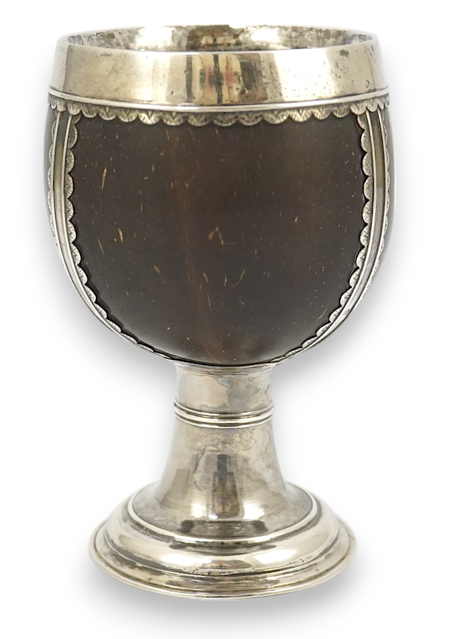 A late George I? silver mounted coconut cup, makers mark only, possible Samuel Eaton, London